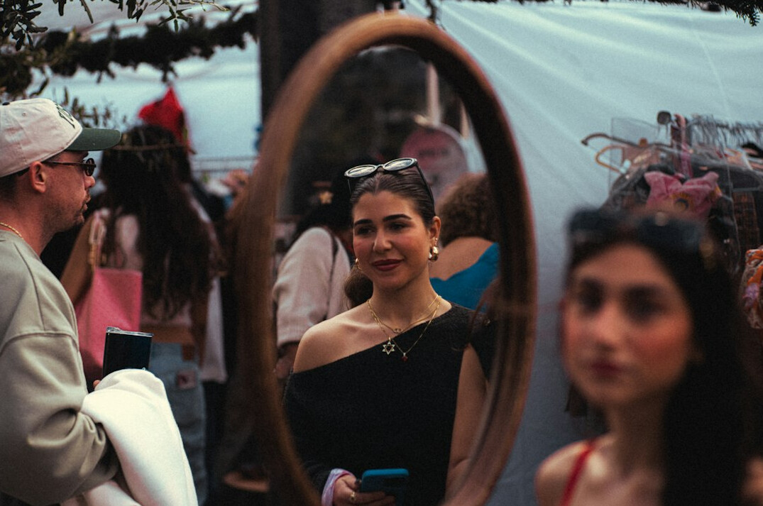 smiling woman in mirror