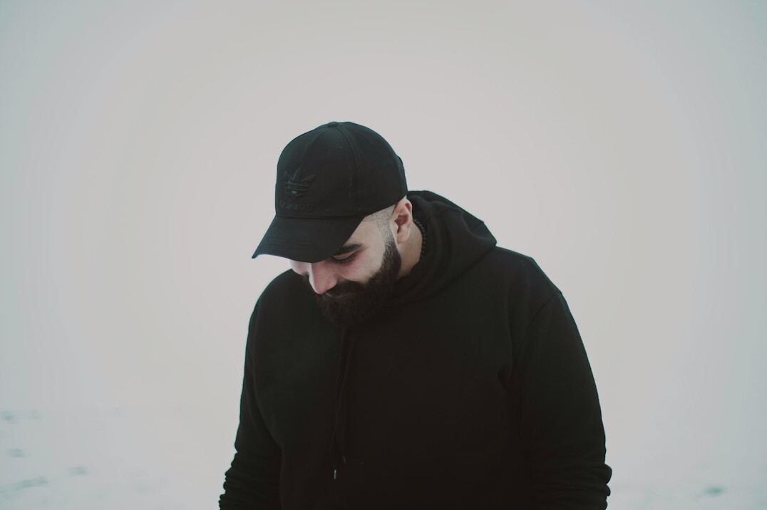 Portrait of a bearded man with a calm expression