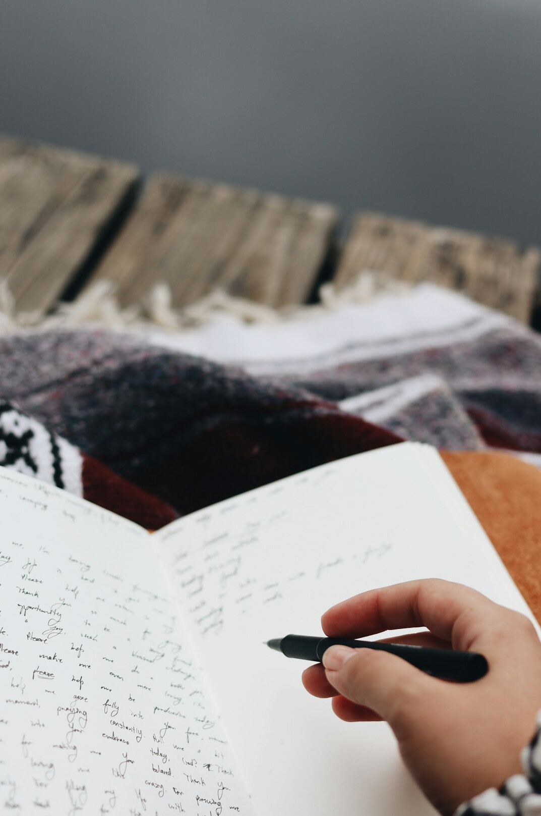 woman writing in journal