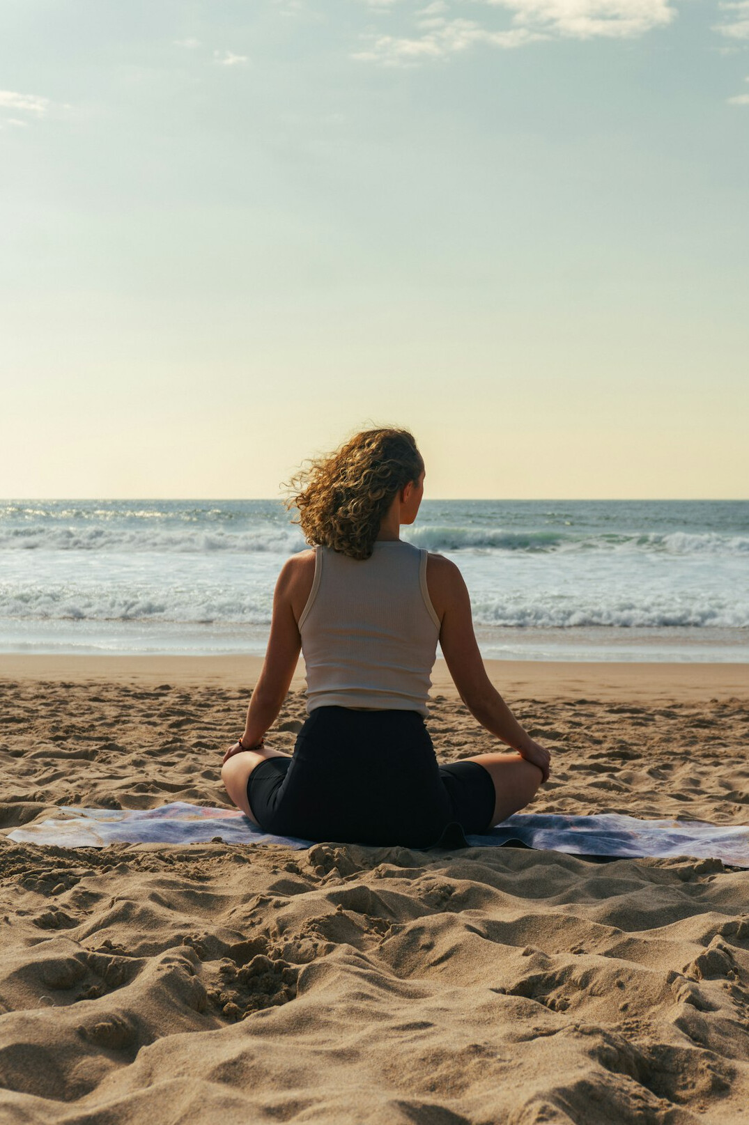 person meditating in nature